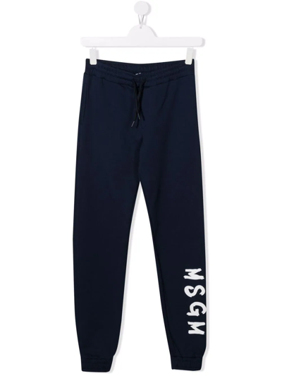 Shop Msgm Teen Logo-print Tapered Track Pants In Blue