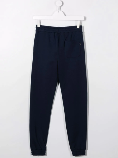 Shop Msgm Teen Logo-print Tapered Track Pants In Blue