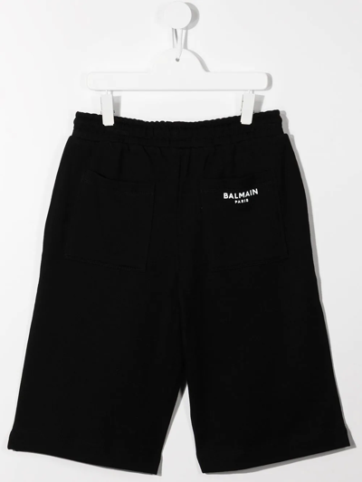 Shop Balmain Teen Logo-print Straight Shorts In Black