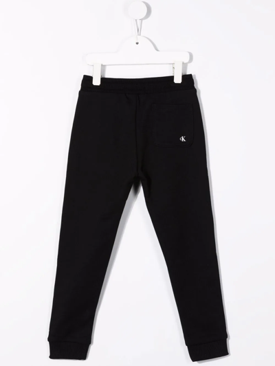 Shop Calvin Klein Logo-print Track Pants In Black