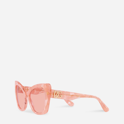 Shop Dolce & Gabbana Dg Crossed Sunglasses In Pink Bubble