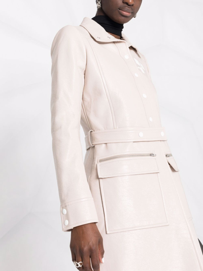 Shop Courrèges Logo-print Lacquered-effect Trench Coat In Neutrals