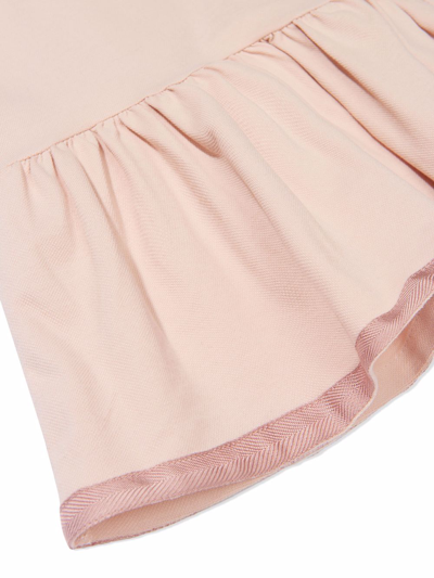 Shop Moncler Peplum Hem Polo Dress In Pink