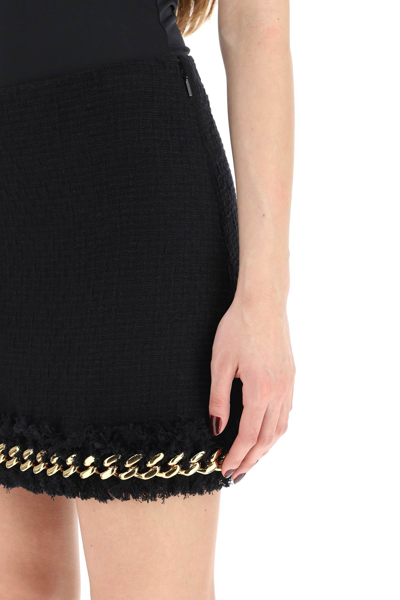 Shop Versace Tweed Mini Skirt With Chain In Black