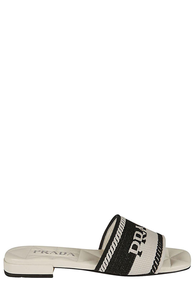 Shop Prada Logo Detailed Slip-on Sandals In Nero