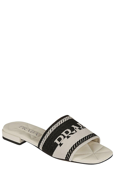 Shop Prada Logo Detailed Slip-on Sandals In Nero