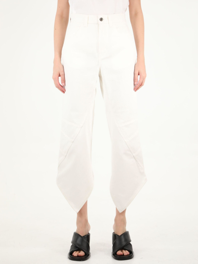 Shop Loewe Cropped Curved Jeans In Ivory