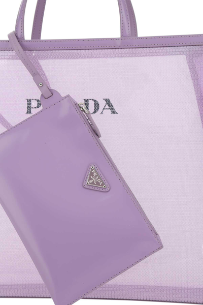 Shop Prada Logo Detailed Top Handle Bag In Lilium