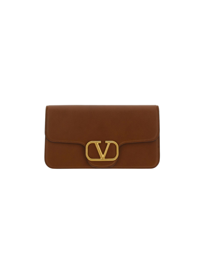 Shop Valentino Garavani Messenger Bag In Tan