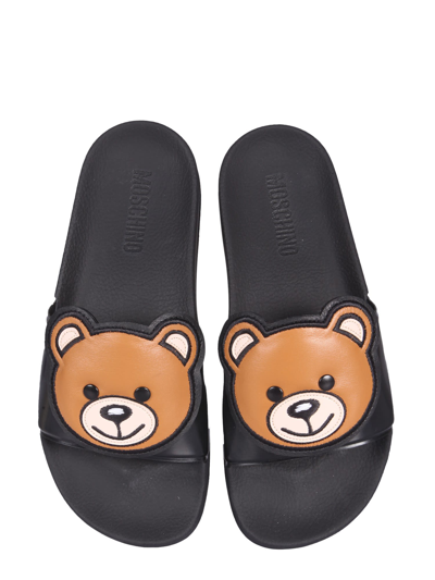 Shop Moschino Slide Teddy Bear Sandals In Nero
