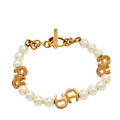 Pre-owned Aigner Gold Tone Faux Pearl Toggle Bracelet
