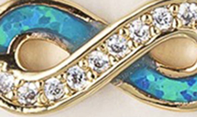 Shop Eye Candy Los Angeles Opal Cubic Zirconia Moon Infinity Sign Evil Eye Bracelet In Gold