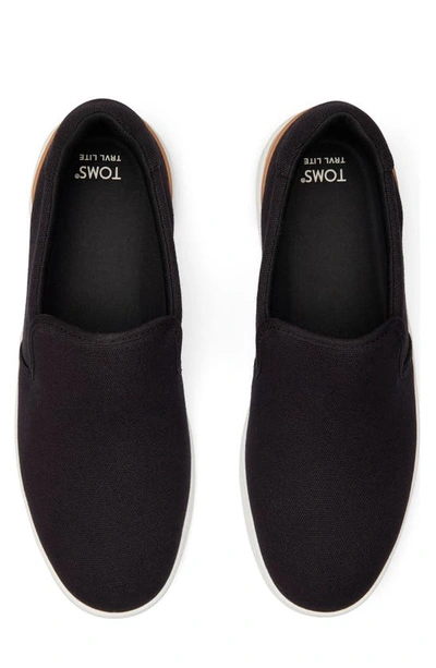 Shop Toms Travel Lite Slip-on Sneaker In Black