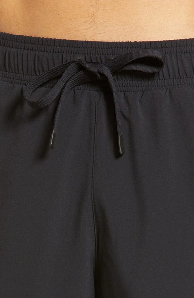 Shop Alo Yoga Unity 2-in-1 Shorts In Black/ Dark Grey