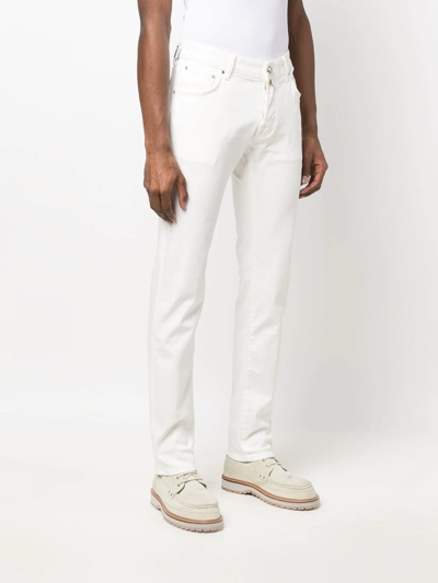 Shop Jacob Cohen Logo-patch Slim-cut Trousers In White