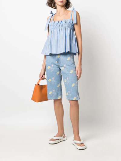 Shop Ganni Floral-print Denim Shorts In Blau