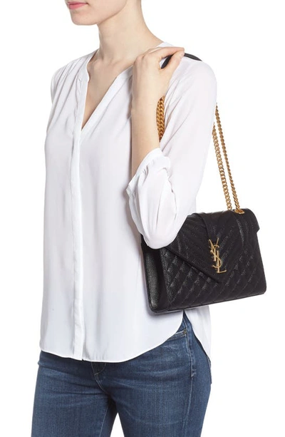Shop Saint Laurent Medium Cassandra Calfskin Shoulder Bag In Noir
