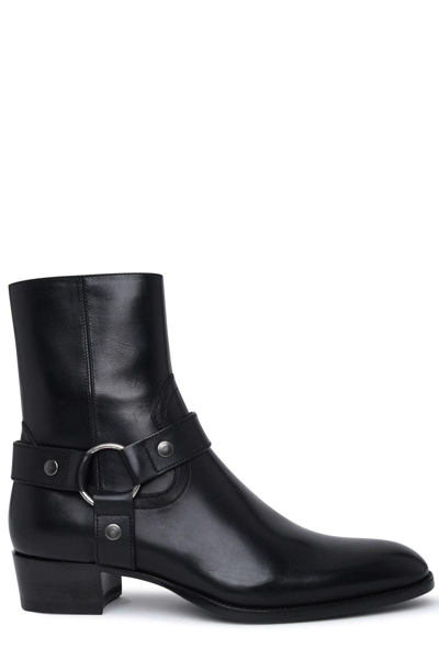 Shop Saint Laurent Wyatt Almond Toe Harness Boots In Black