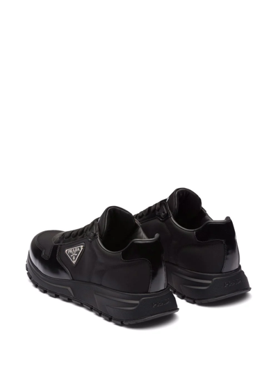 Prada Downtown Nappa Leather And Nylon Sneakers In Schwarz