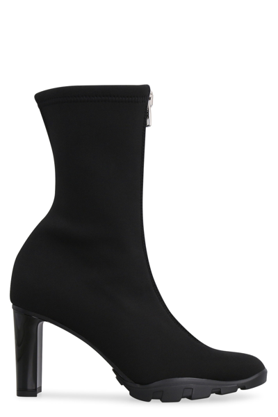 Shop Alexander Mcqueen Slim Tread Ankle Boots In Black