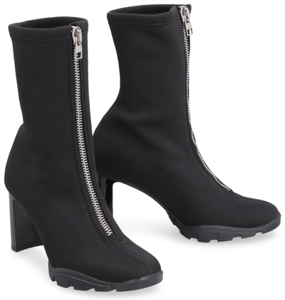 Shop Alexander Mcqueen Slim Tread Ankle Boots In Black