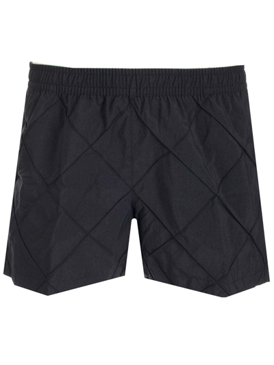 Shop Bottega Veneta Geometric Patterned Swim Shorts In Black
