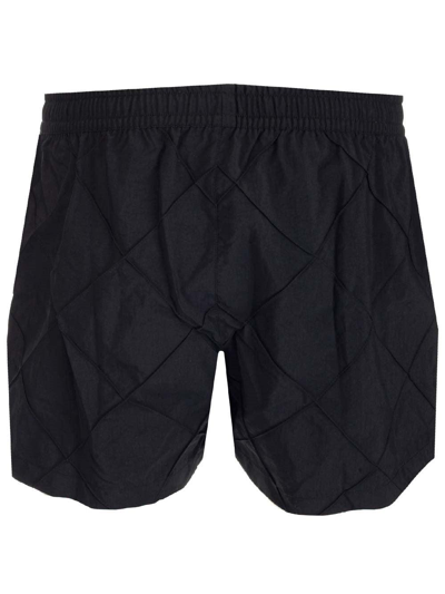 Shop Bottega Veneta Geometric Patterned Swim Shorts In Black