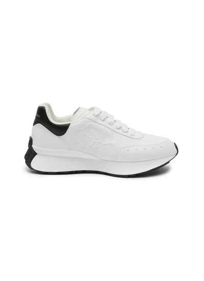 Shop Alexander Mcqueen Rose Embossed Low-top Leather Sneakers In White