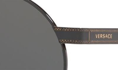 Shop Versace 52mm Mirrored Round Sunglasses In Black/ Gold/ Black Solid