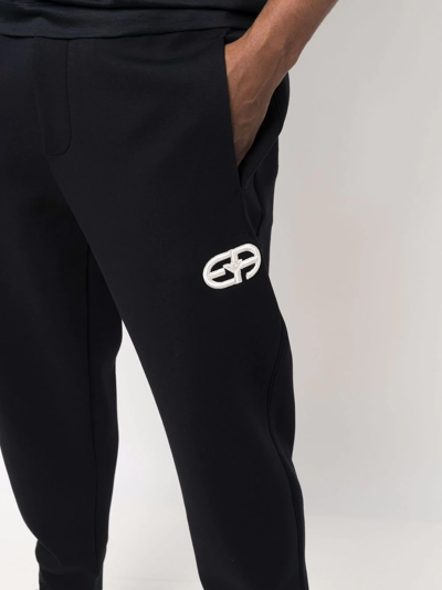 Shop Emporio Armani Logo-embroidered Track Pants In Blue