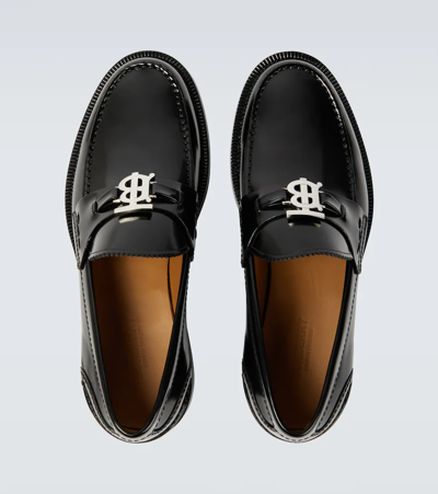 Shop Burberry Polished Leather Loafers In Black