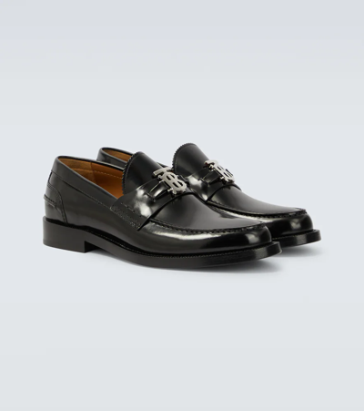 Shop Burberry Polished Leather Loafers In Black