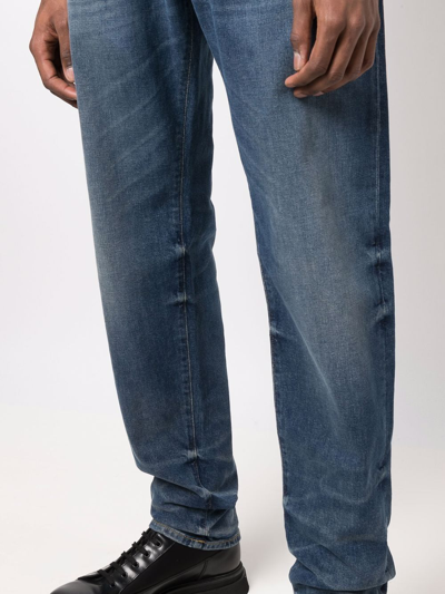 Shop Represent Faded-effect Jeans In Blau