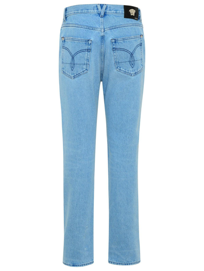 Shop Versace Distressed Straight Leg Jeans In Blue