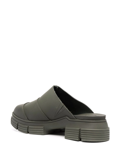 Shop Ganni City Recycled-rubber Mules In Grün
