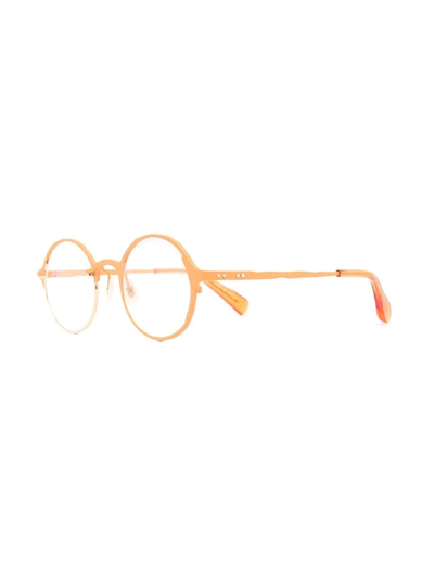 Shop Masahiromaruyama Contrast-detail Round Glasses In Gold