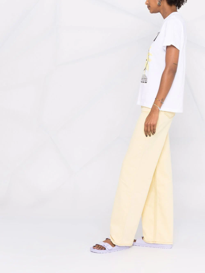 Shop Ganni Magny Wide-leg Jeans In Gelb