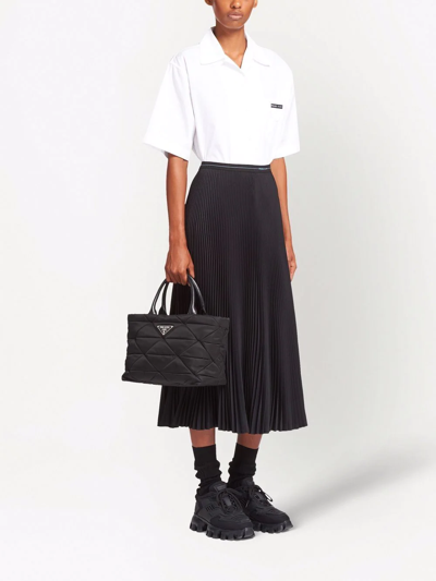 Prada Small Re-nylon Logo Plaque Top Handle Bag In Black