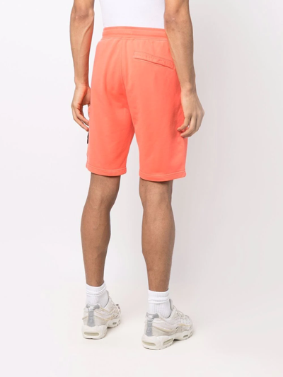 Shop Stone Island Compass-patch Cotton Track Shorts In Orange