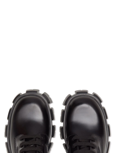 Shop Prada Moonlith Pouch-detail Ankle Boots In Black