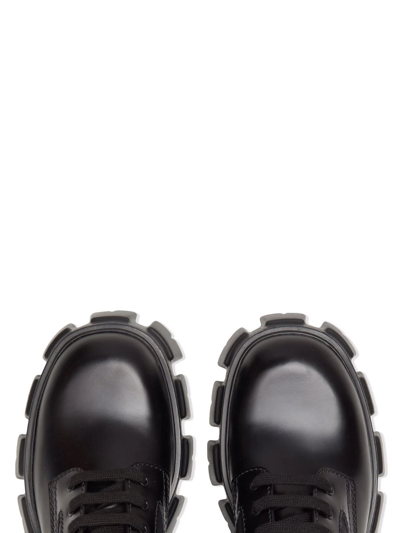Prada Cai Xukun Also Decorates Small Bags Of Military Style Boots With Ankle Wrapping. In Black