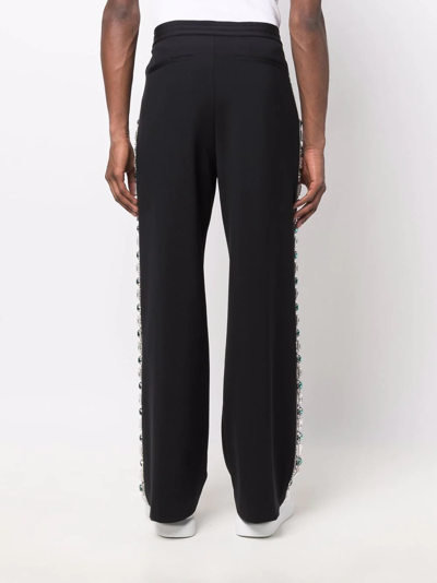 Shop Balmain Side-detail Trousers In Schwarz