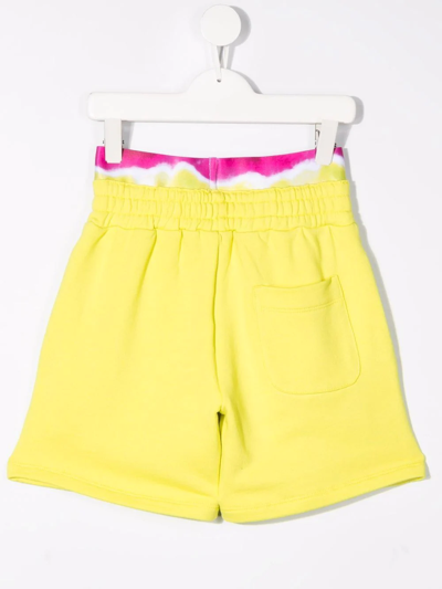 Msgm Tie-dye Trim Logo Print Runner Shorts In Yellow