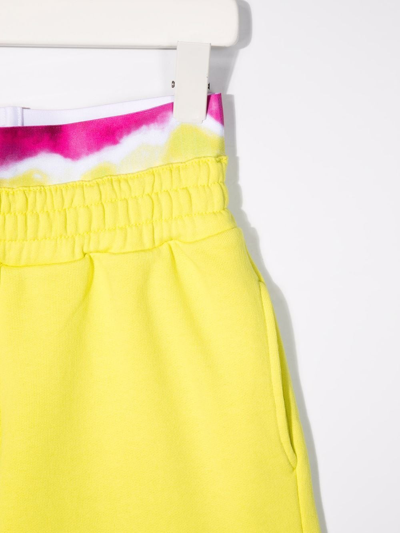 Shop Msgm Tie-dye Trim Logo Print Runner Shorts In Yellow