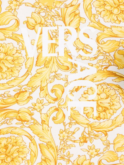 Shop Versace Graphic-print Romper In Yellow