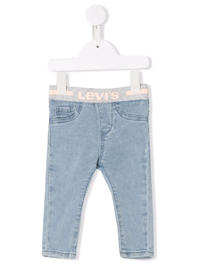 Shop Levi's Logo Waistband Jeans In Blue