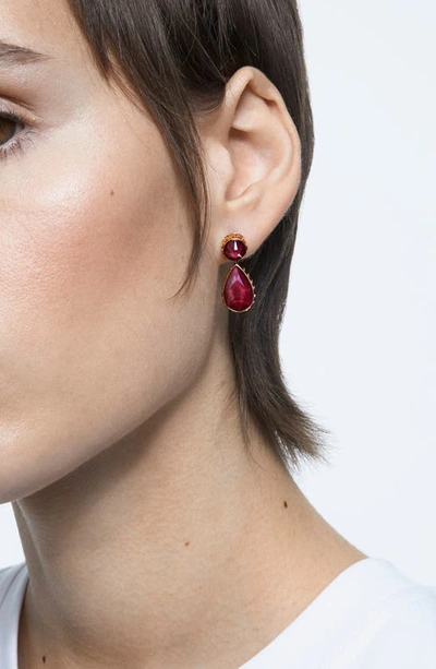 Shop Swarovski Orbita Mismatched Crystal Drop Earrings In Violet