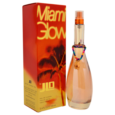 Shop Jennifer Lopez Miami Glow By  For Women - 3.4 oz Edt Spray In Amber / Orange / Pink