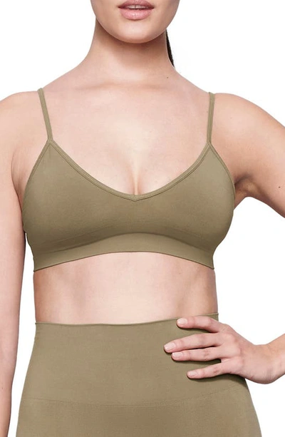 Shop Skims Soft Smoothing Seamless Bralette In Army Green