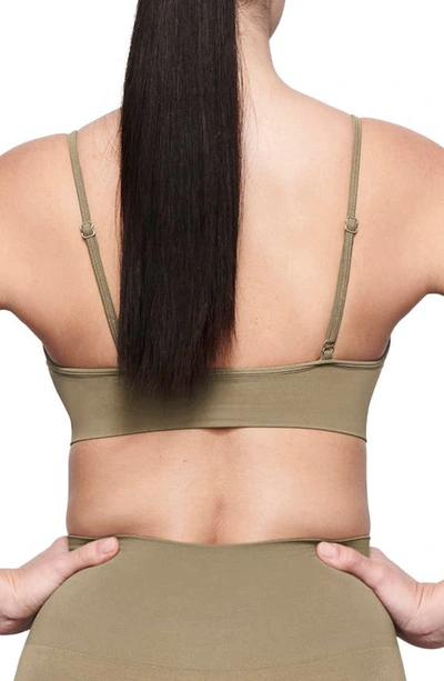 Shop Skims Soft Smoothing Seamless Bralette In Army Green